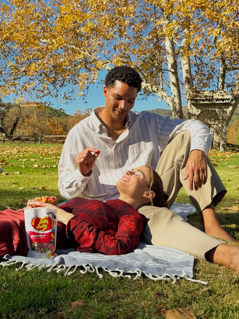 Couple enjoying Jelly Belly gourmet jelly beans together — sharing the joy of authentic flavors